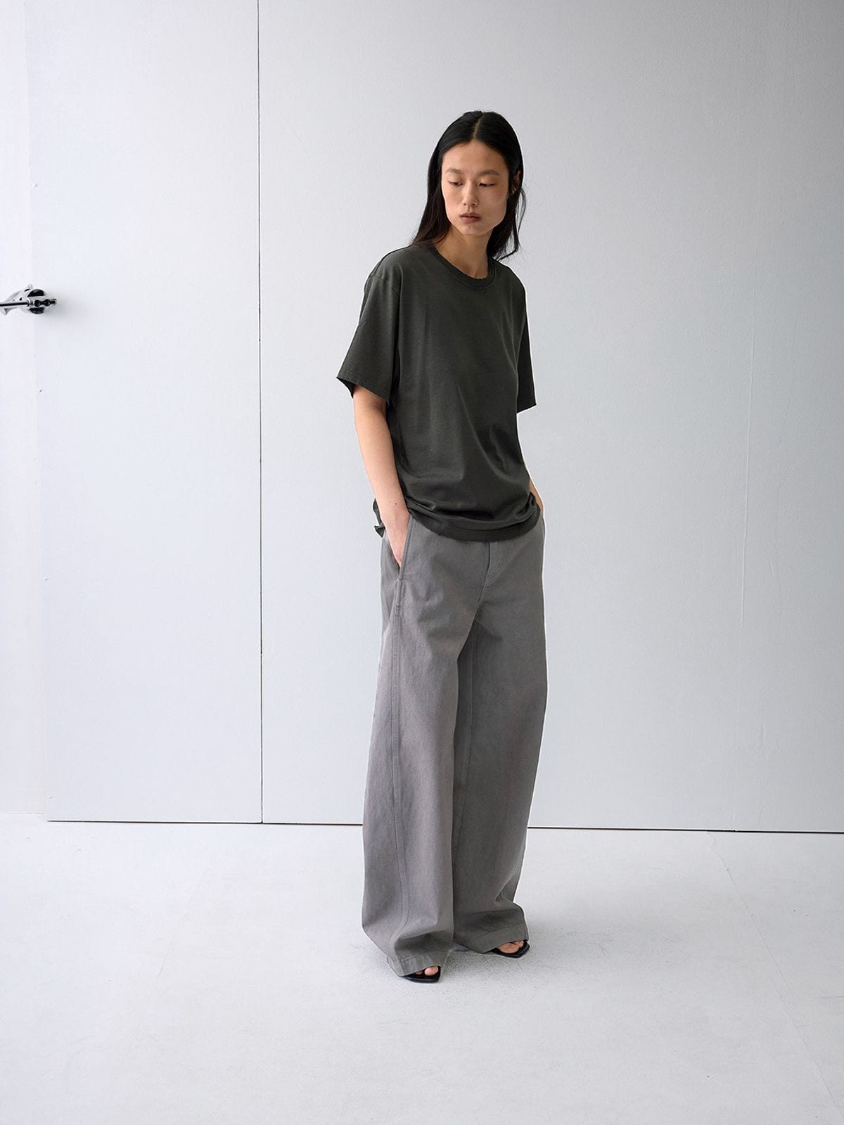 Random Piece Distressed Cotton Blend T Shirt in Gray - On Female Model
