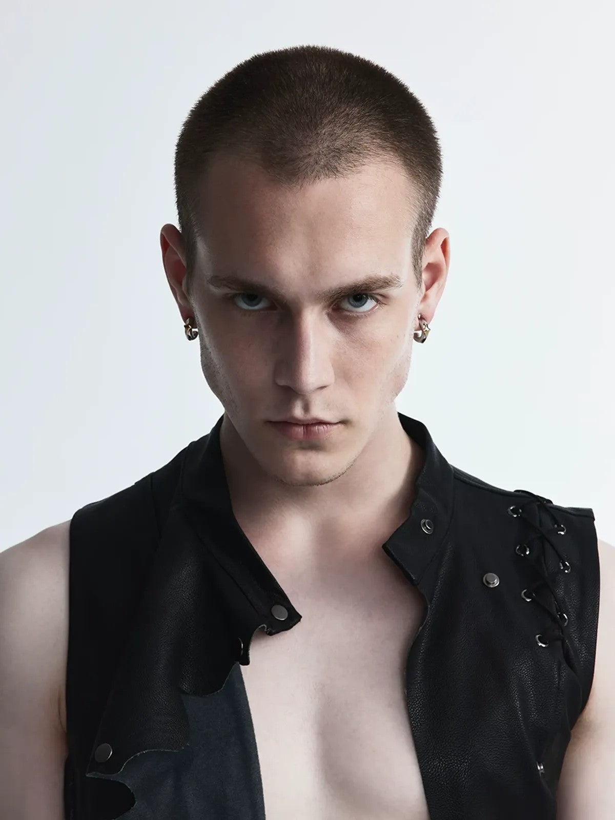 BLACKHEAD Two Tone Starburst Hoop Earrings in Gold - On Male Model