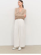 MSBEAST Cotton Blend Tapered Cropped Trousers in White - On Female Model