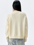 MEDM Floral Embroidered Knit Cardigan in Cream - On Model