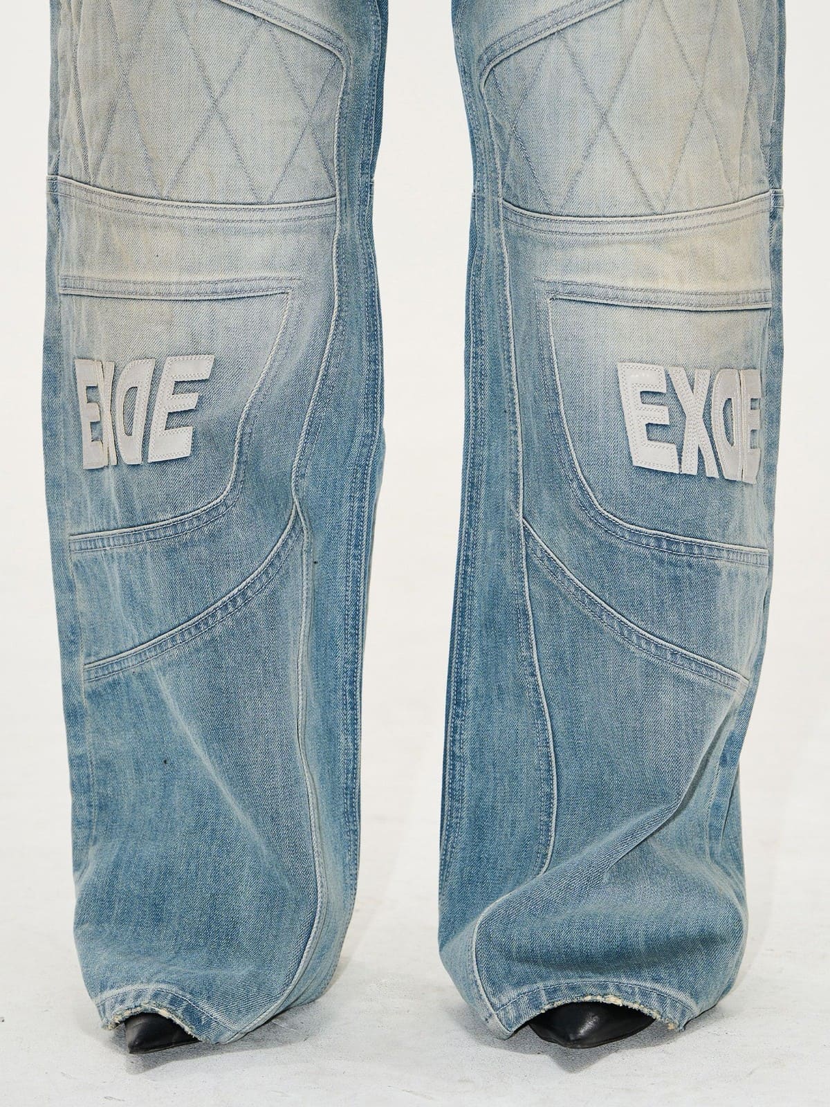 BLINDNOPLAN Paneled Embroidered Distressed Denim Pants in Blue - On Model