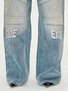 BLINDNOPLAN Paneled Embroidered Distressed Denim Pants in Blue - On Model