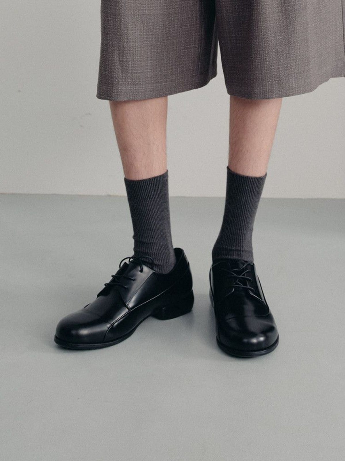 JCAESAR STUDIO Cowhide Leather Derby Shoes in Black - On Model