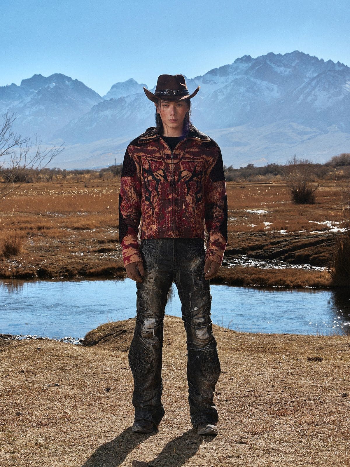 PERSONSOUL Distressed Snake Wash Panelled Jeans in Black - On Male Model
