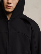 JCAESAR STUDIO Arch Panel Zip Up Hoodie in Black - On Male Model