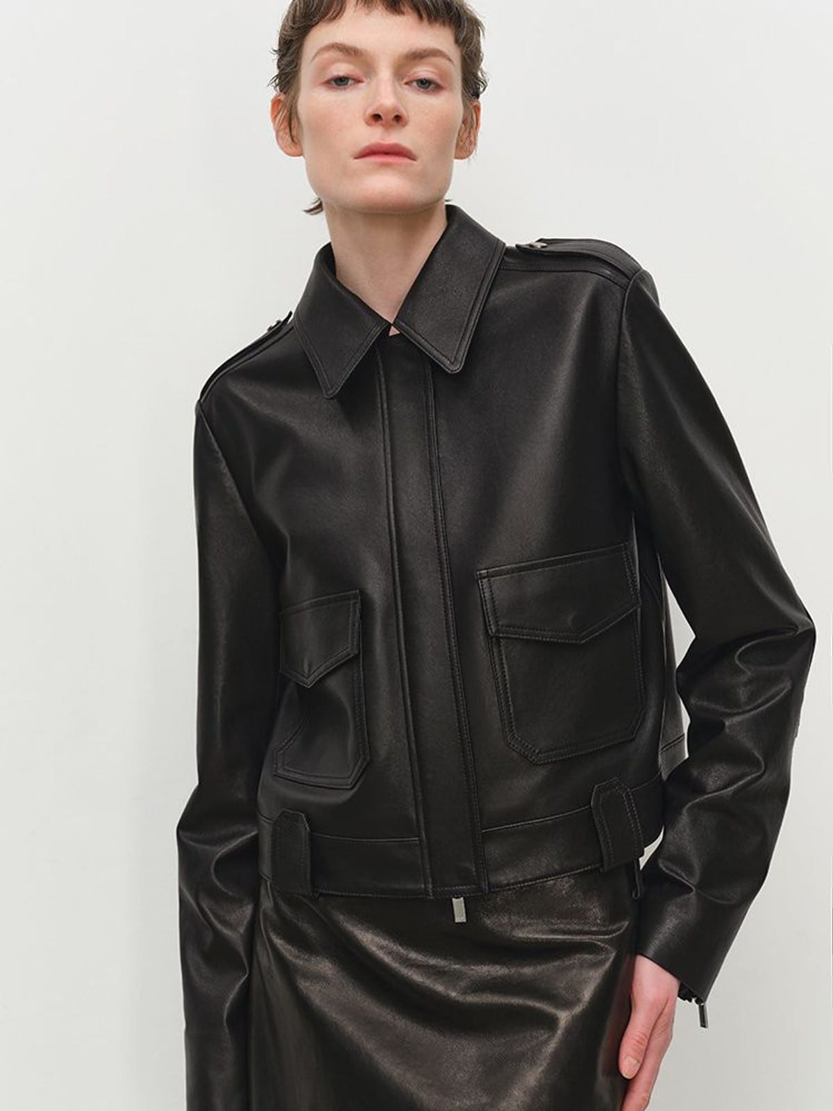 MSBEAST Cropped Sheepskin Moto Jacket in Black - On Female Model