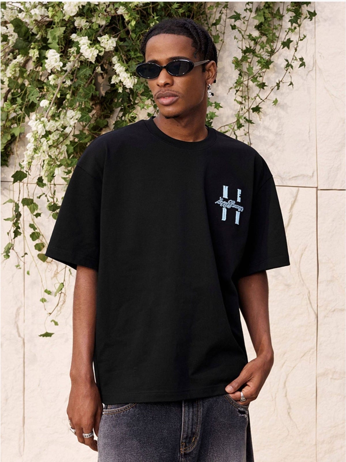 MEDM Tufted Logo Cotton T Shirt in Black - On Male Model
