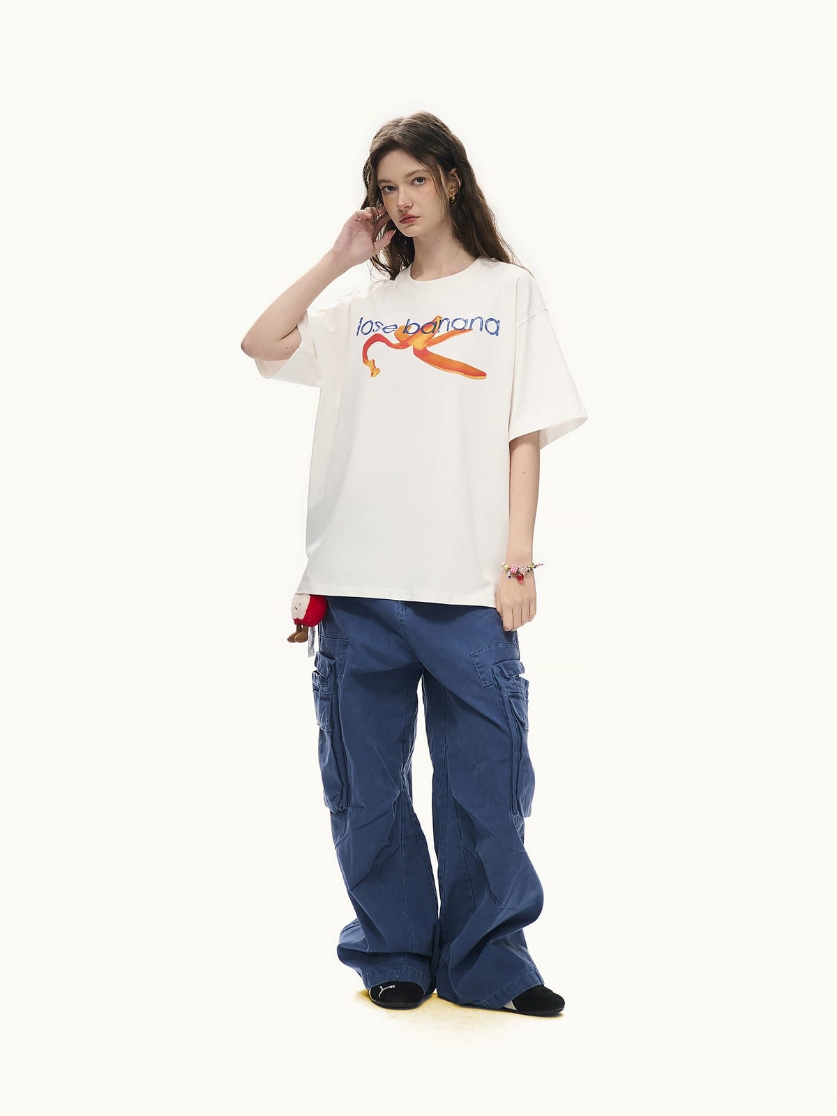 LOSTCTRL Distressed Banana Print Sorona T Shirt in White - On Female Model