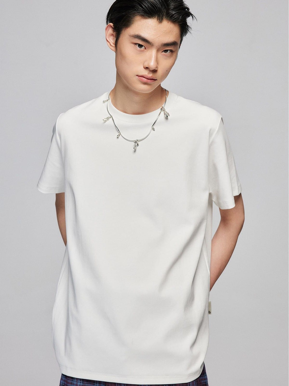 SIMPLE PROJECT Misaligned Seam Crewneck T Shirt in White - On Male Model