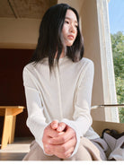 TEASEL Worsted Wool Mock Neck Cardigan in Cream - On Female Model