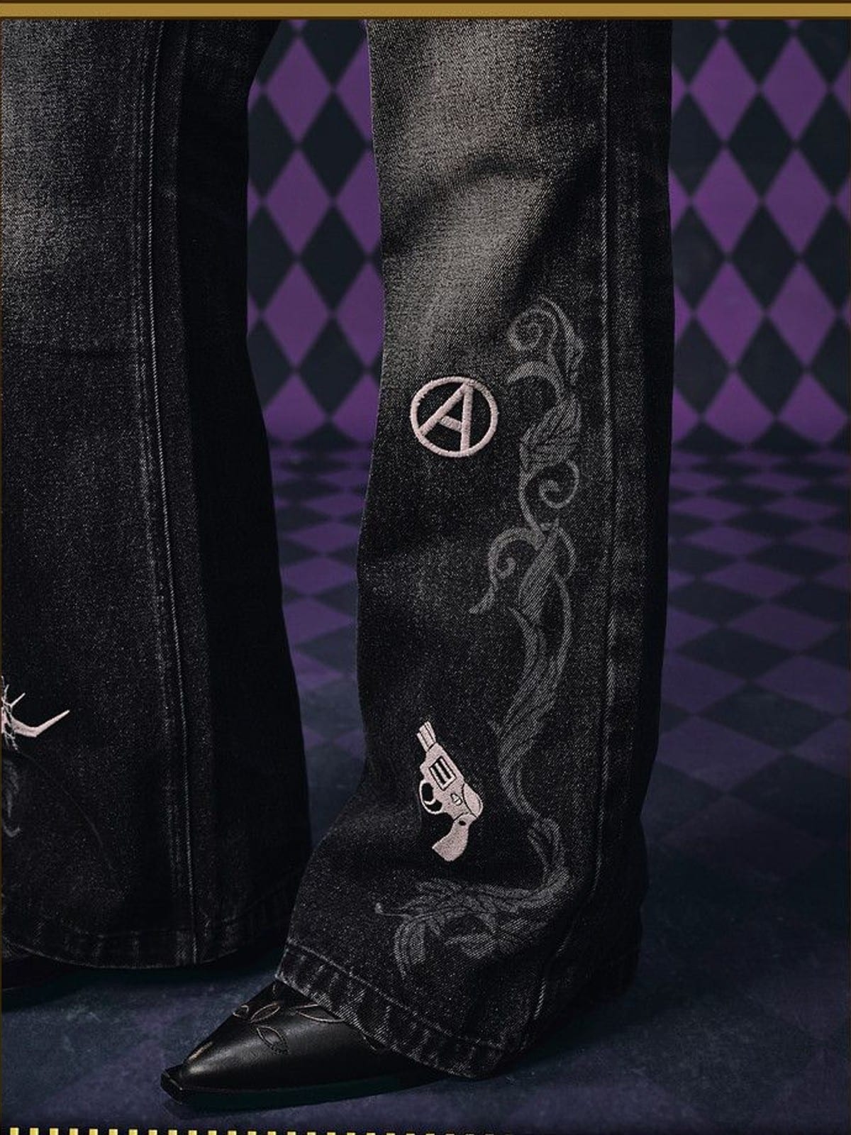 MEDM Icon Embroidered Distressed Jeans in Black - On Model