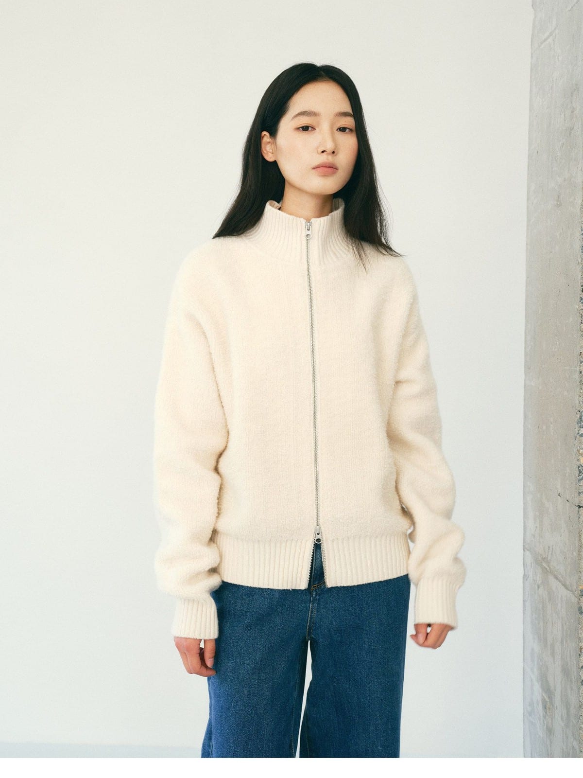 TEASEL Merino Wool Boucl Zip Cardigan in White - On Female Model