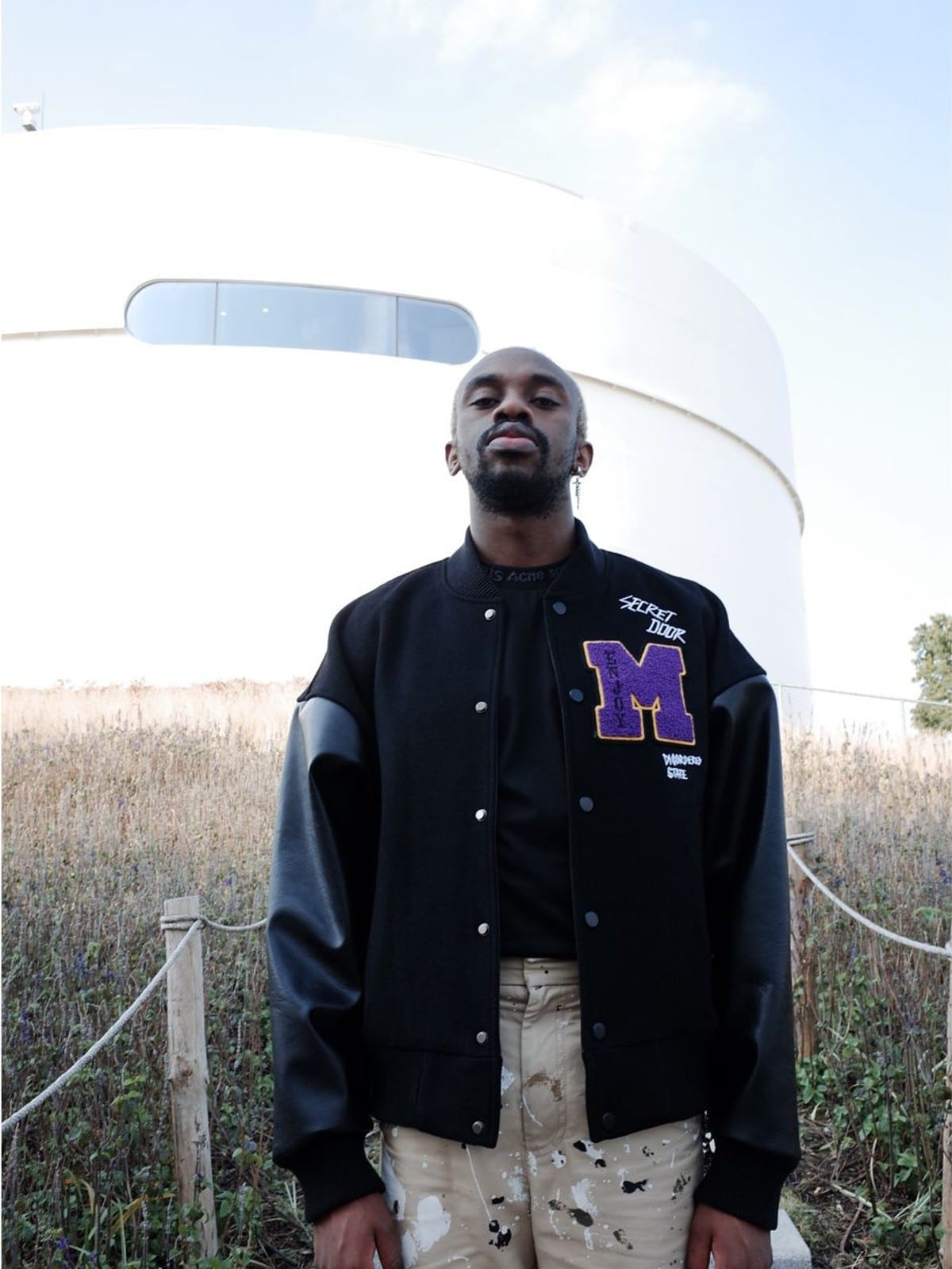 MEDM Wool Blend Varsity Jacket in Black - On Male Model