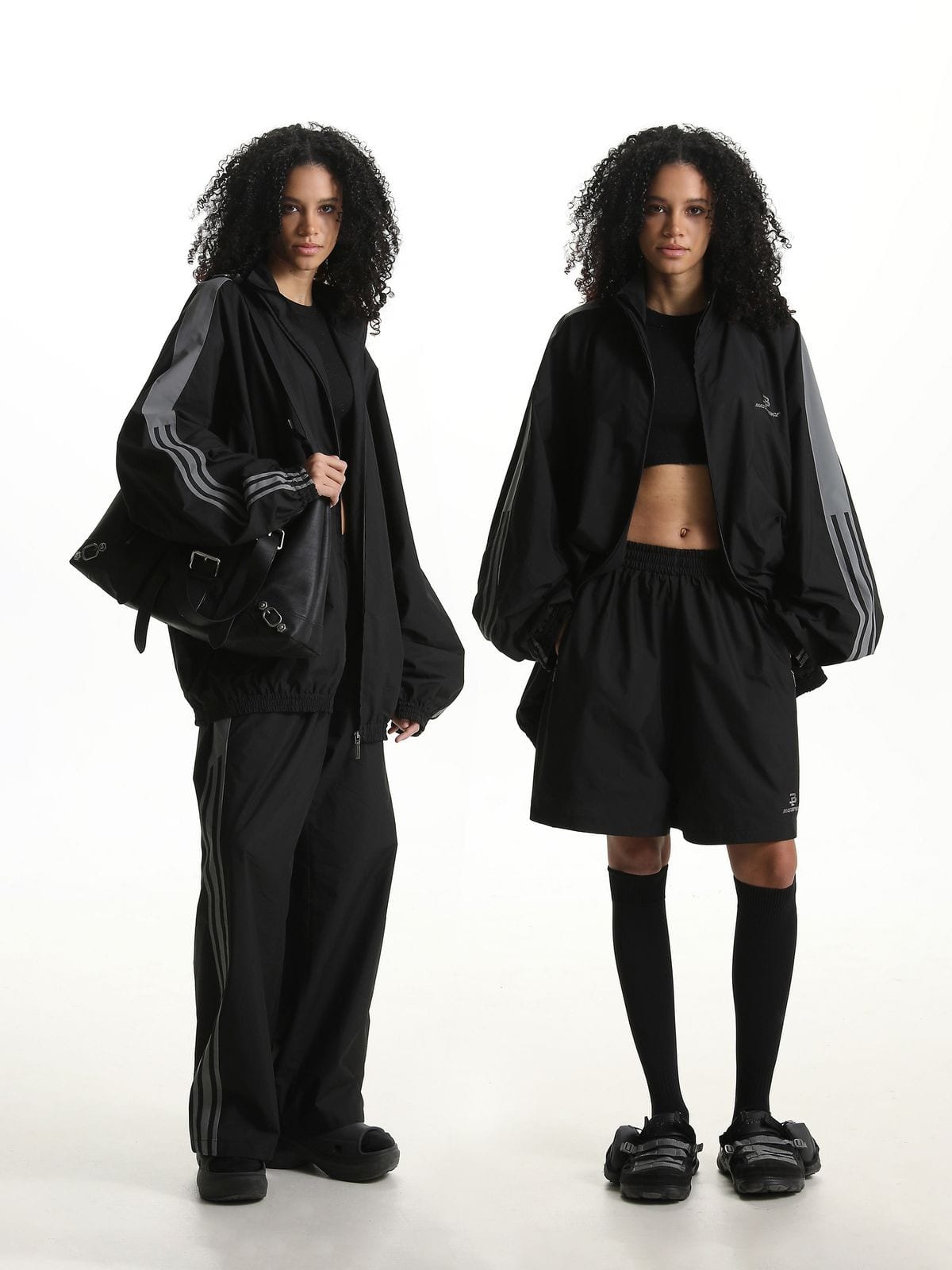 MASONPRINCE Striped Cotton Blend Track Shorts in Black - On Female Model