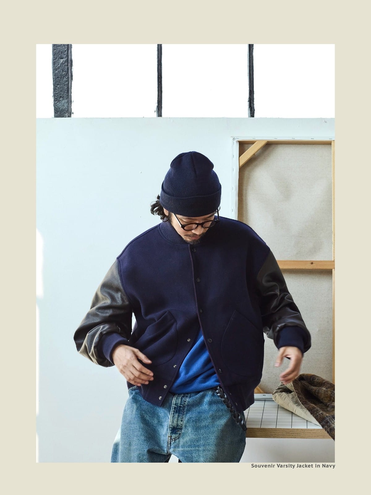 USAGE Reversible Velvet Leather Varsity Jacket in Navy Blue - On Male Model