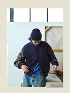 USAGE Reversible Velvet Leather Varsity Jacket in Navy Blue - On Male Model