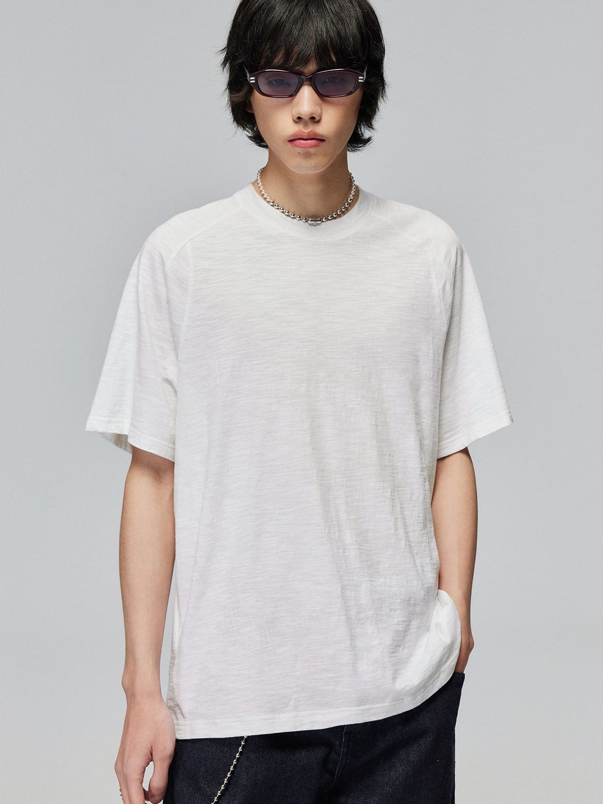 SIMPLE PROJECT Washed Slub Cotton Raglan Tee in White - On Male Model