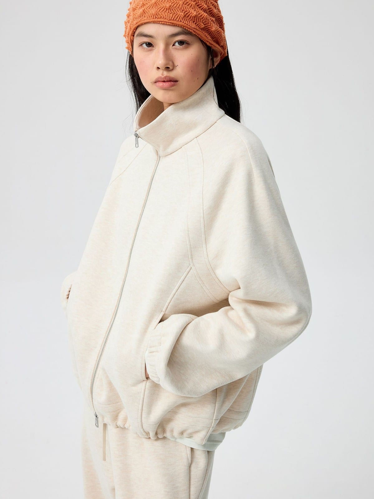 SIMPLE PROJECT Ruffled Adjustable Collar Zip Hoodie in Beige - On Female Model