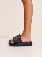 SMFK Cowhide Leather Cross Hardware Slides in Black - On Model