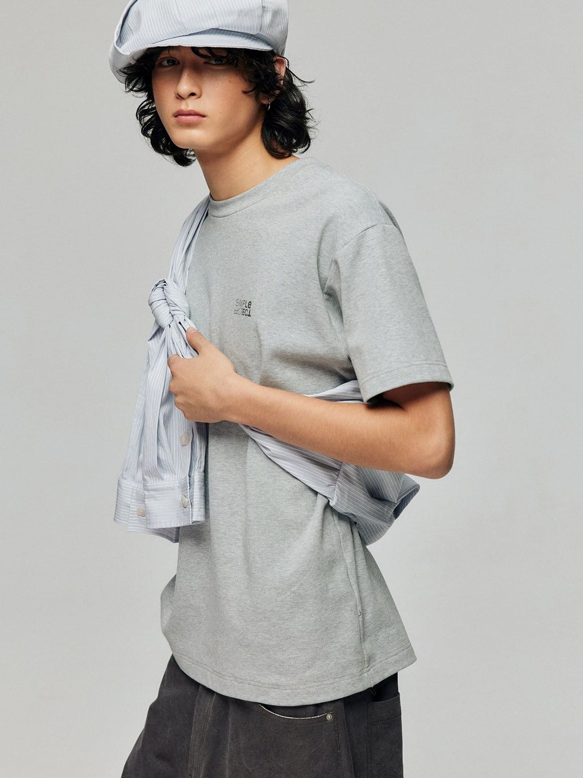 SIMPLE PROJECT Inverted Silver Logo Crewneck T Shirt in Gray - On Male Model