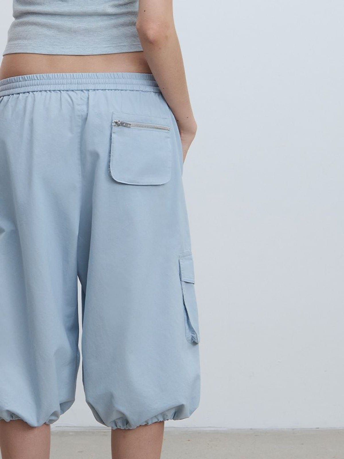 RARELY ALIKE Cropped Cotton Lantern Cargo Shorts in Sky Blue - On Model