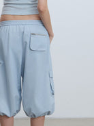 RARELY ALIKE Cropped Cotton Lantern Cargo Shorts in Sky Blue - On Model
