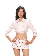 SweetChilling Double Breasted Polka Dot Mini Skirt in White - On Female Model