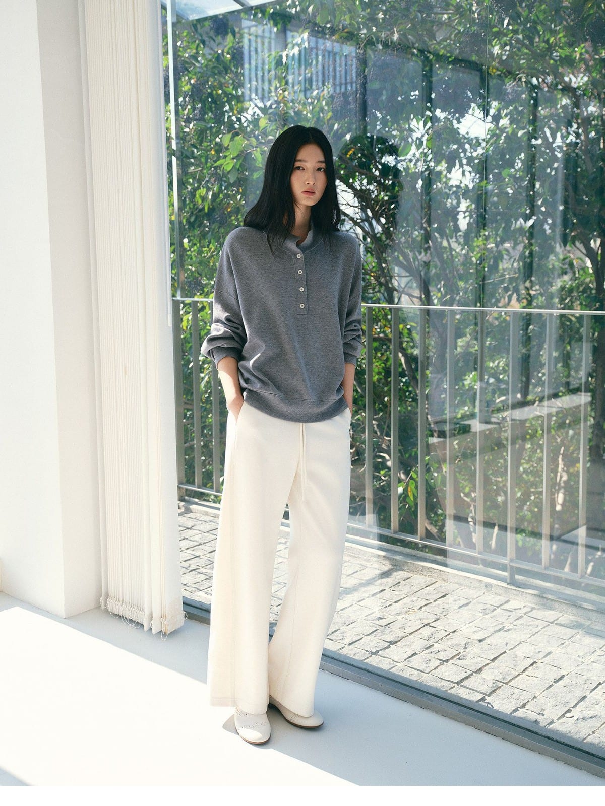 TEASEL Worsted Wool Henley Sweatshirt in Gray - On Female Model
