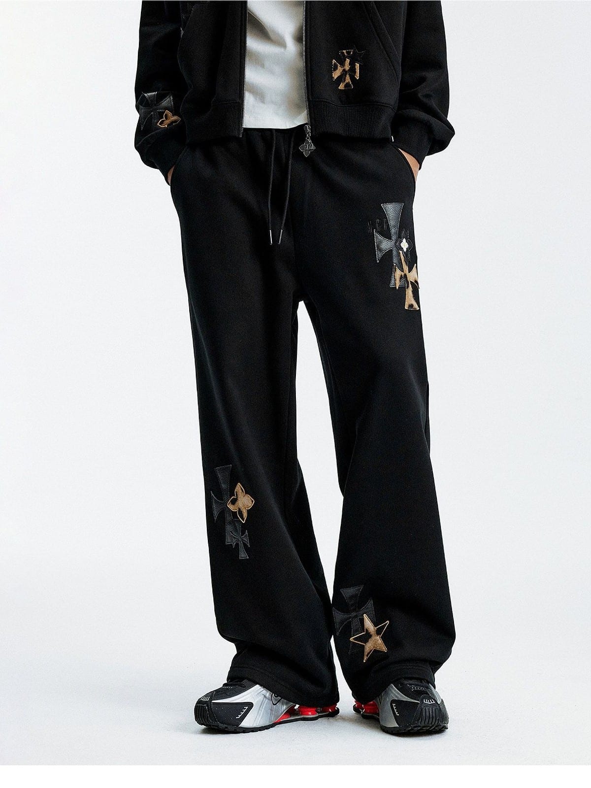 MEDM Leopard Leather Patch Drawstring Pants in Black - On Model