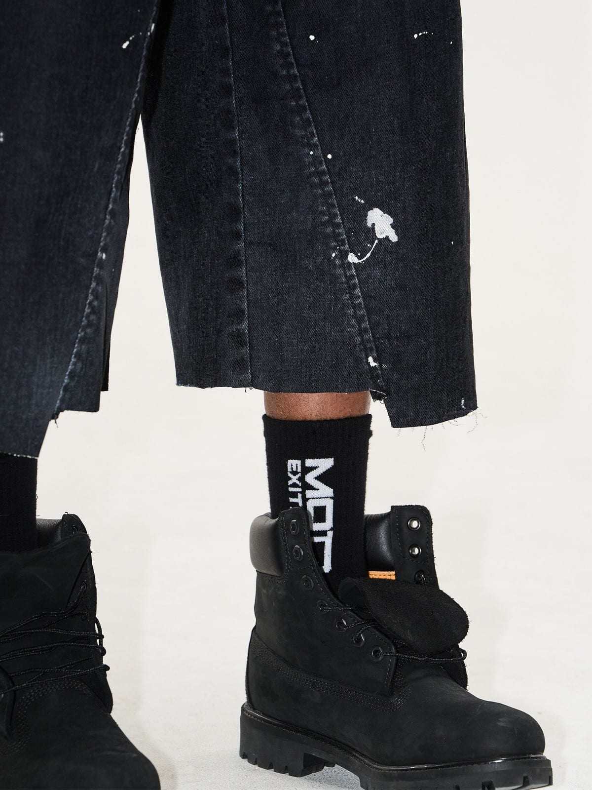 BLINDNOPLAN Ink Splatter Denim Carpenter Shorts in Black - On Model