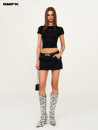 SMFK Studded Cotton Miniskirt in Black - On Female Model