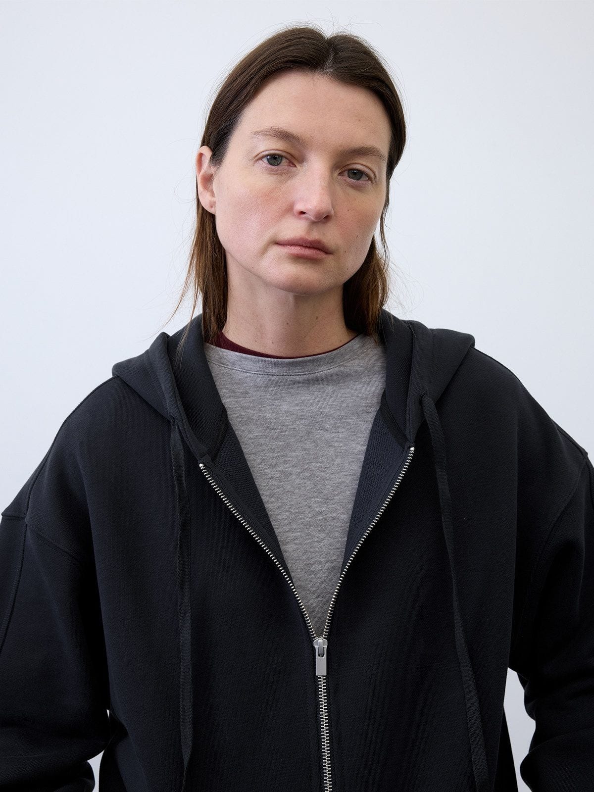 Random Piece Cotton Lyocell Zip Up Hoodie in Black - On Female Model