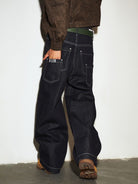 MEDM Contrast Stitch Denim Cargo Jeans in Navy Blue - On Model