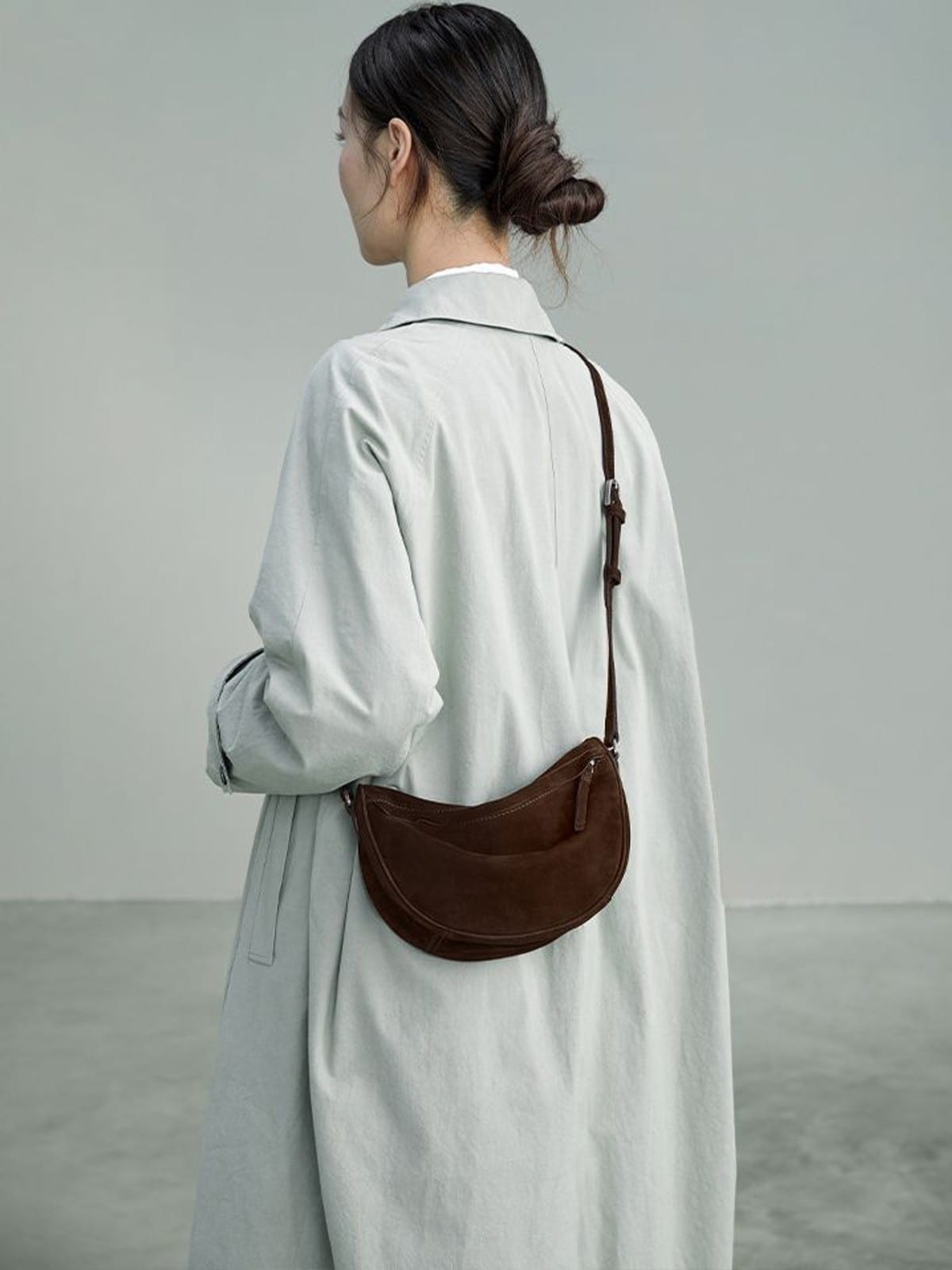 QIUZHEN Vegetable Tanned Leather Crescent Bag in Brown - On Model