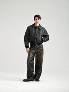 Retro 21 Distressed Faux Leather Padded Jacket in Black - On Male Model