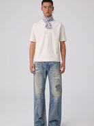 SIMPLE PROJECT Distressed Patchwork Flared Jeans in Blue - On Male Model