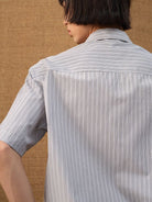 JCAESAR STUDIO Striped Short Sleeve Curved Hem Shirt in Gray - On Model