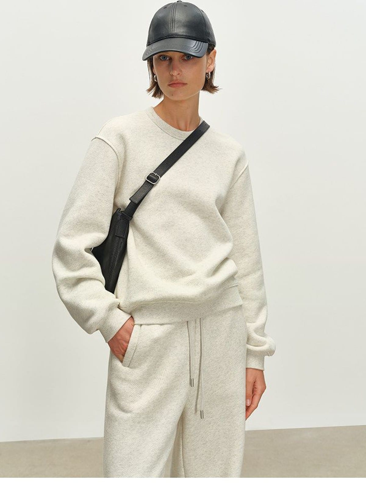 MSBEAST Fleece Lined Cotton Sweatshirt Pants Set in Beige - On Female Model