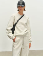 MSBEAST Fleece Lined Cotton Sweatshirt Pants Set in Beige - On Female Model