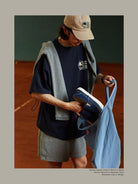 USAGE Retro Tennis Graphic Cotton T Shirt in Navy Blue - On Male Model