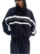 BLINDNOPLAN Color Blocked Zip Up Track Jacket in Black - On Male Model