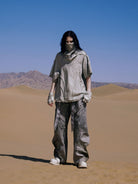 PERSONSOUL Deconstructed Distressed Cotton T Shirt in Gray - On Model