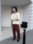 TRIANGLE PROJECT Ribbed Cotton Henley Sweatshirt in White - On Male Model