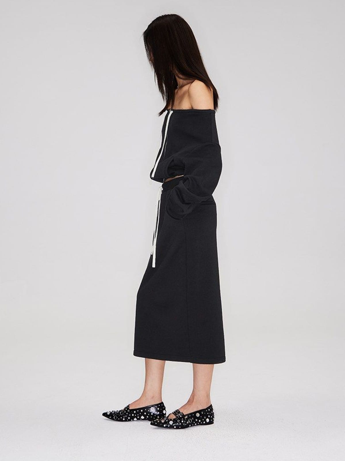 RARELY ALIKE Cotton Side Slit Midi Skirt in Black - On Female Model
