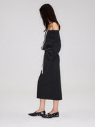 RARELY ALIKE Cotton Side Slit Midi Skirt in Black - On Female Model
