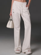 SMFK Cotton Blend Flared Sweatpants in White - On Female Model