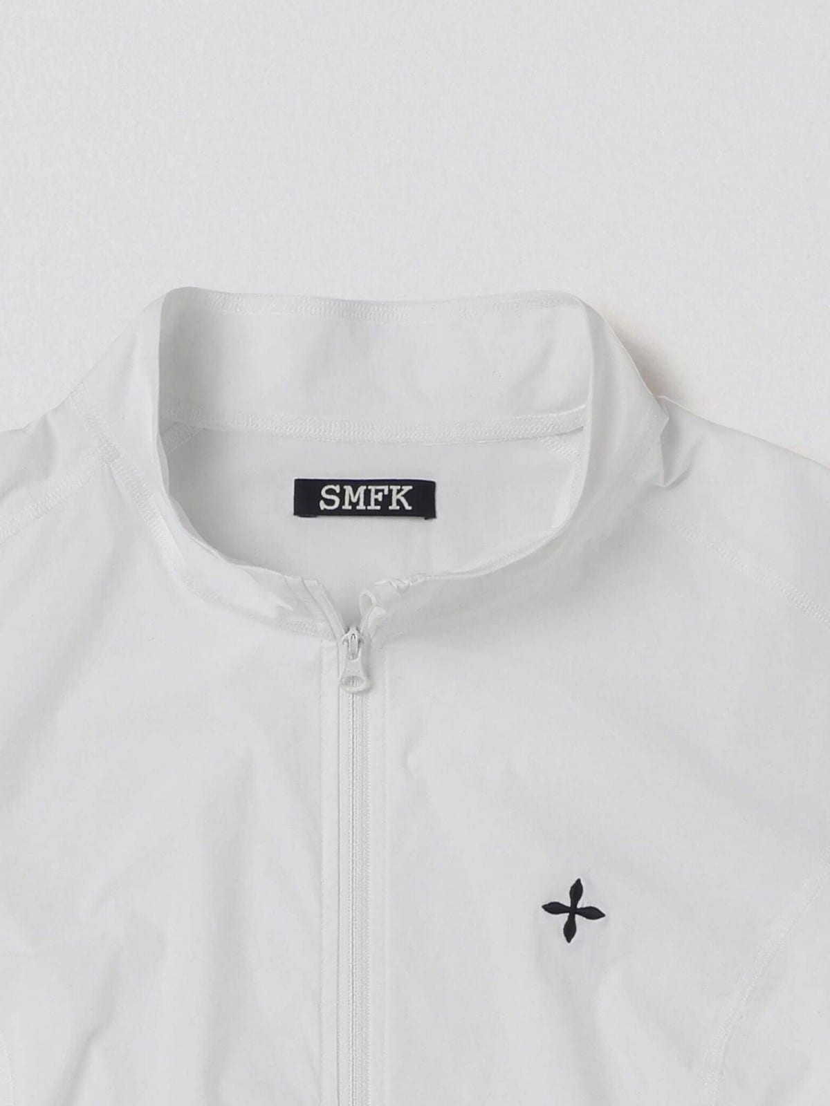 SMFK Cropped Zip Front Nylon Jacket in White - Detail