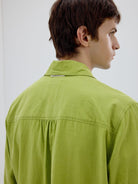 SIMPLE PROJECT Washed Lyocell Long Sleeve Shirt in Green - On Male Model