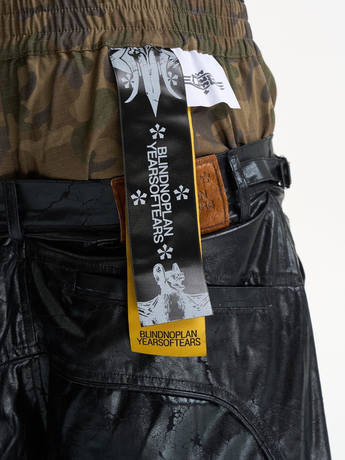 BLINDNOPLAN Faux Leather Layered Cargo Pants in Black - On Model