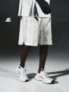 LOSTCTRL Distressed Structural Print Shorts in White - On Model